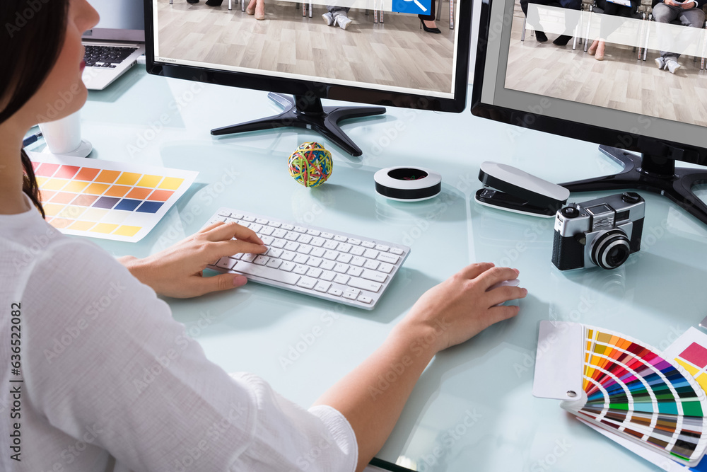Poster Female Designer Working On Multiple Computer