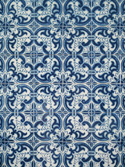 Close-up of a wall tiled with handmade vintage tiles from Portugal. Beautiful blue and white tones. Tradition concept