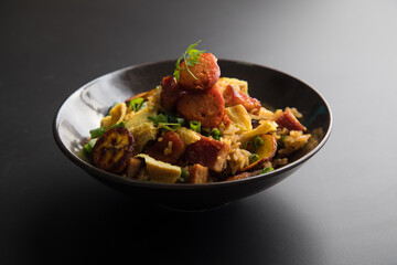 Chaufa amazonico fried rice with chorizo and  smoked pork cecina peru peruvian food