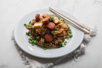 Chaufa amazonico fried rice with chorizo and  smoked pork cecina peru peruvian food