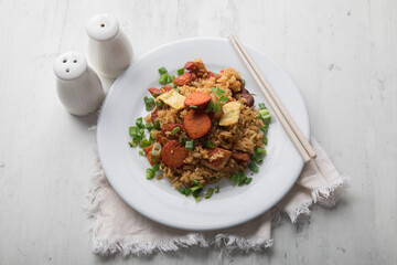 Chaufa amazonico fried rice with chorizo and  smoked pork cecina peru peruvian food