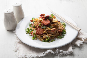 Chaufa amazonico fried rice with chorizo and  smoked pork cecina peru peruvian food