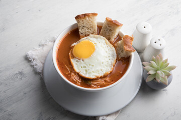 Sopa criolla a la minuta peruvian beef soup food with fried egg