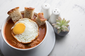 Sopa criolla a la minuta peruvian beef soup food with fried egg