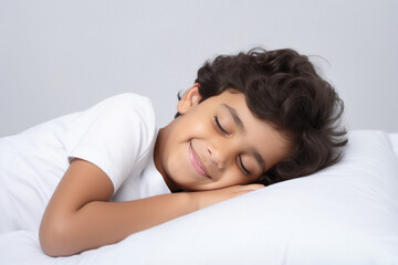 Obraz na płótnie Canvas Little boy sleeping on his bed