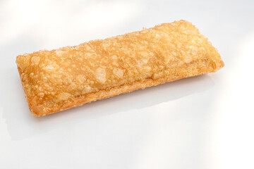 Crispy Apple Pie with selective focus on a white background.