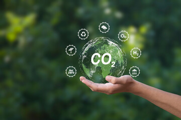The carbon neutral concept reduces CO2 emissions, reducing global warming. Goal of net zero carbon...