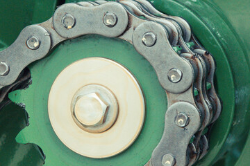 Metal chain and gear in agricultural or industrial machine. Technology