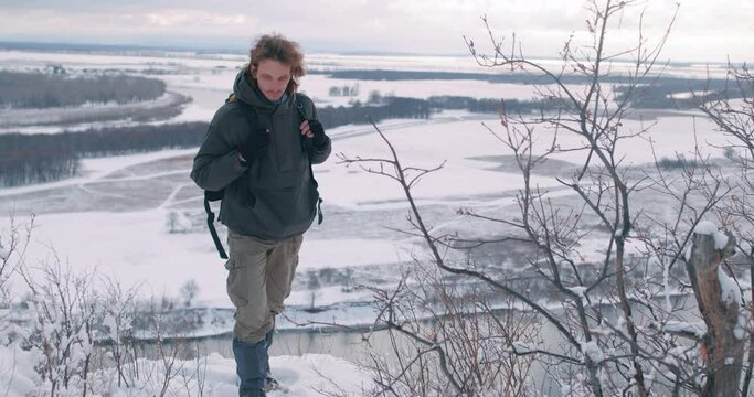 handsome hicker walking on top of mountain, looking up, climbing, man reach goals, aims Slow motion Never give up, male going to dream Adventure, tourism, freedom Lifestyle Hobby