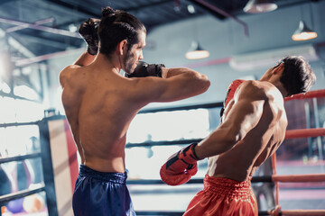 Fototapeta na wymiar Boxer's determination shines in rounds, contesting with devotion to showcase Thai martial art skills