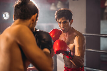 Boxer's determination shines in rounds, contesting with devotion to showcase Thai martial art skills
