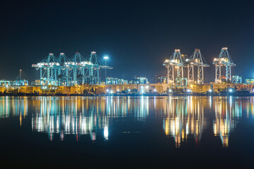 cranes in port at night in Algeciras Spain