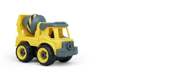 Yellow plastic concrete mixer truck toy isolated on white background. construction vechicle truck....