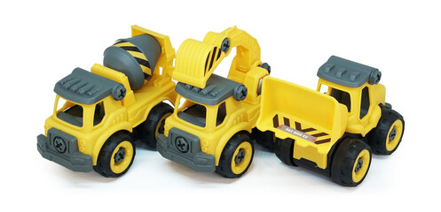heavy construction toy line up in a row isolated on white background. plastic toy consist of truck, mixer and loader.