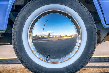 Wheel of an old car. Mirror surface
