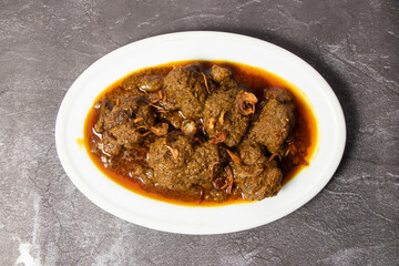 Spicy Beef Bhuna korma karahi masala served in dish isolated on background top view of bangladesh...
