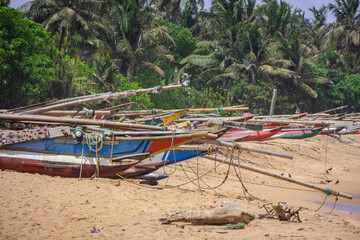Fishing boats parked on the sand, fishing industry in Sri Lanka