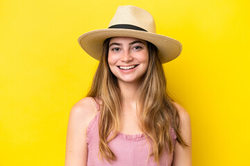 Young caucasian woman isolated on yellow background