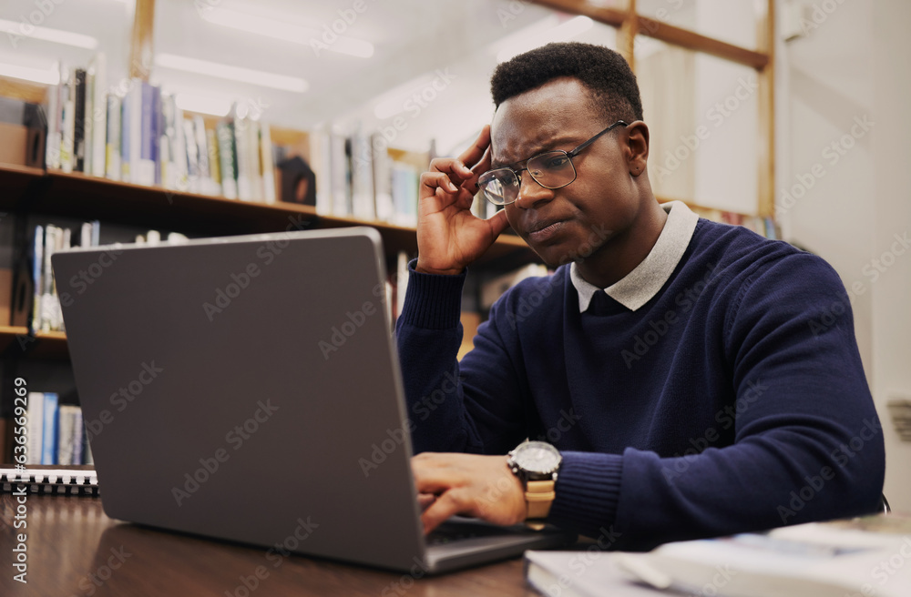 Aufkleber man, student and thinking on laptop in library for studying, university research or headache and str