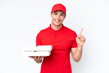 Pizza delivery caucasian man with work uniform picking up pizza boxes isolated on white background...