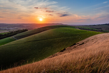 August sunset from mount Caburn over the Lewes downs east Sussex south east England UK © SuxxesPhoto