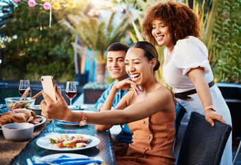 Friends, food and selfie at outdoor table for holiday, Christmas or thanksgiving on social media....