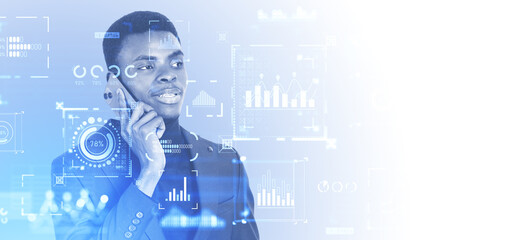 African man on phone and digital charts