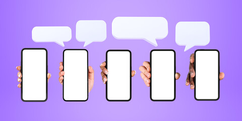 Diverse men and women hands holding smartphones with blank displays and speech bubbles