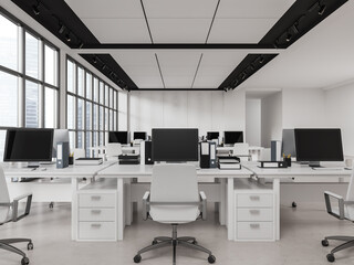 White workplace interior with armchairs and table with computers in row, window