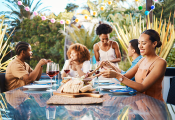 Friends, food and celebration, lunch in garden and happy event with diversity, conversation and...