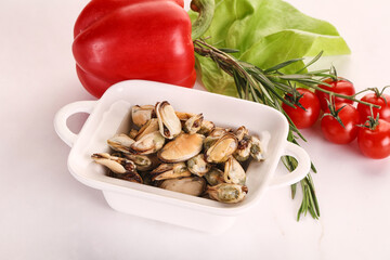 Marinated mussels in the bowl