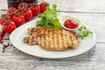 Grilled pork steak with ketchup