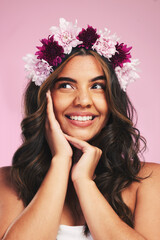 Woman, flowers and crown for thinking of beauty in studio with natural skincare, spring plants and pink background. Face, model and floral wreath for sustainable cosmetics, dermatology and hair care