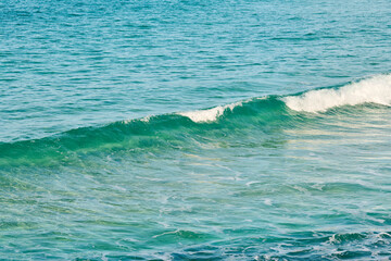 Naklejka premium Turquoise wave on the sea
