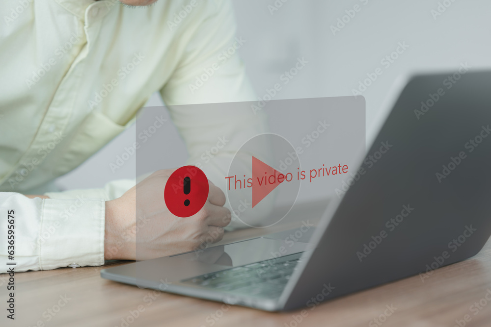 Aufkleber Young man using a laptop to play social media but this video is blocked or privacy settings have been set. Searching for more internet, and search engine optimization. Subscribing and following.