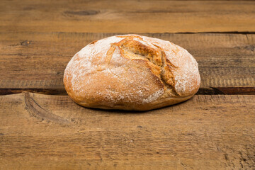 white bread over wooden background