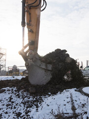 earthworks with excavator on construction site