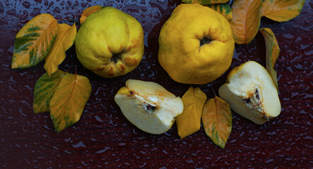 quince and leaves on the table