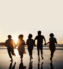 Silhouette, summer and friends holding hands at sunset beach for fun and travel. Banner space, men and women group running outdoor in water with love, support and happiness on vacation or holiday