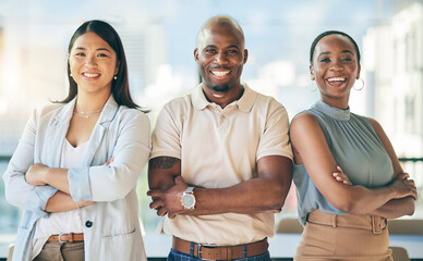 Happy, crossed arms and portrait of a business people in the office with confidence and happiness. Young, corporate and face headshot of group of professional designers standing in a modern workplace