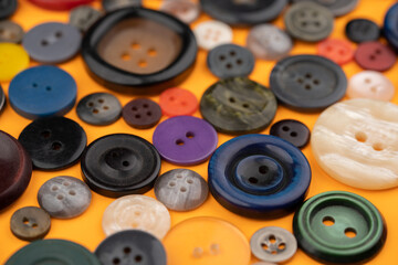 Many different buttons on a yellow background