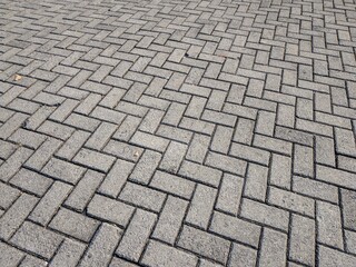 Gray Brick Stone Pavement. Pavement in Vintage Design Ground Flooring Square Pattern Texture Background.