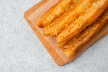 Youtiao or Yu Char Kway is a long golden-brown deep-fried strip of wheat flour dough of Chinese...