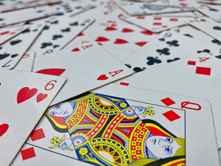 Playing cards spread out on a table