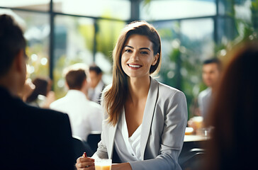 Young business woman smiling in her office