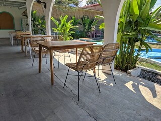 Close up of tables and chairs in sunny cafe. lifestyle, interior design, coffee and local business.