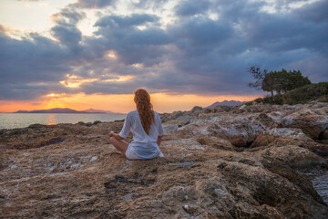 Meditation wellness on beach. Happy zen girl, spiritual fitness breathing and health for...