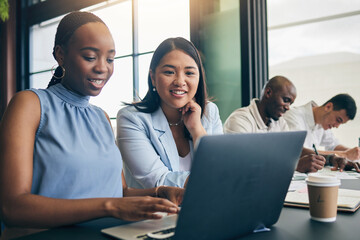 Business women, laptop and planning, teamwork or collaboration in coffee shop or coworking office at marketing agency. Professional people typing and online research on computer for project startup