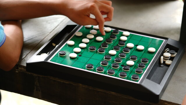 Reversi is a strategy board game for two players, played on an 8×8 uncheckered board. It was invented in 1883. Othello, a variant with a fixed initial setup of the board, was patented in 1971.