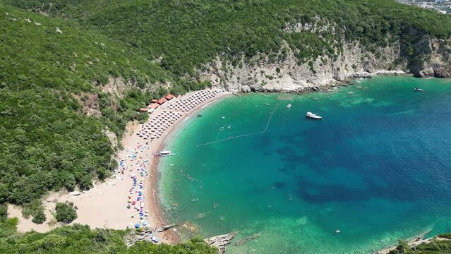 Queen's Beach ( Kraljichina Beach ) in Canj, Montenegro. Aerial view of paradise tropical beach, surrounded by green hills. Montenegro. Balkans. Europe.